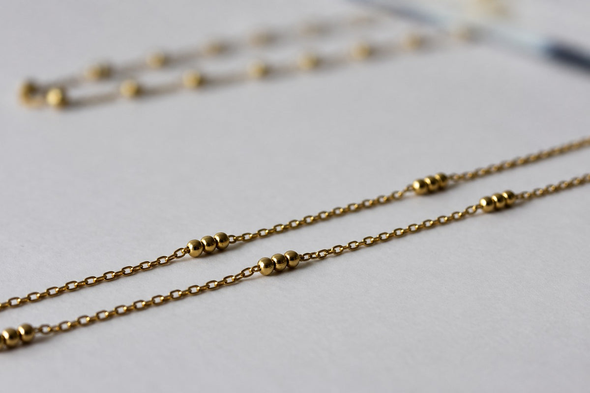Collier Trois billes plaqué or